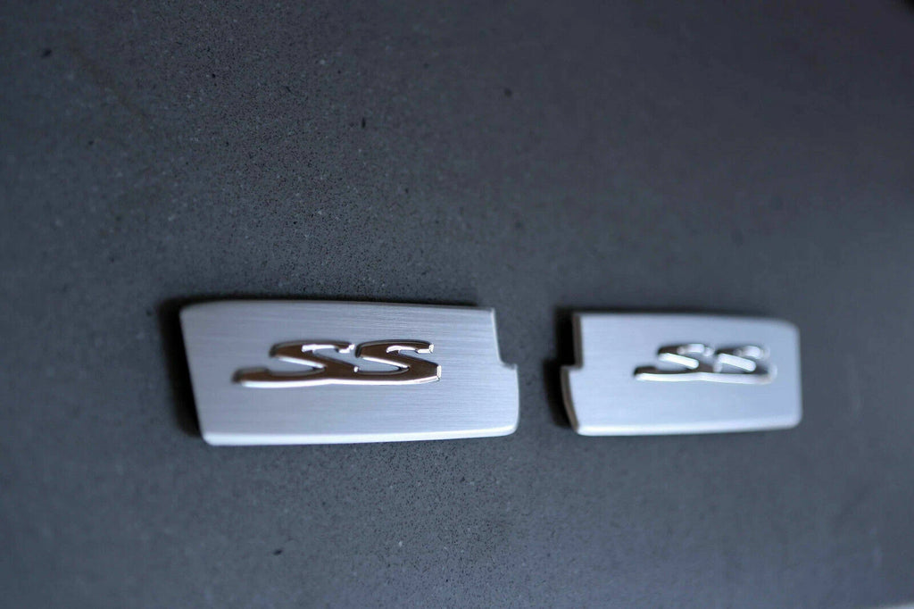 INTERIOR FRONT DOOR HANDLE INSERT BADGE FOR HOLDEN VE SS COMMODORE UTE