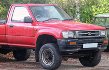 Load image into Gallery viewer, *NEW* GRILLE HEAD LIGHT RIMS (SILVER GREY) SUIT TOYOTA HILUX LN106 4WD 1991-1997